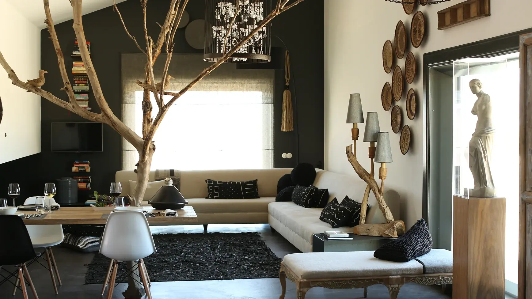 A spacious suite with a living/dining area, kitchenette, mezzanine with a single bed, 1 adjoining bedroom and a private pool. The suite has an area of 84 sqm and can accommodate 2 adults and 2 children as well as a third adult in an extra bed.